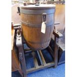 EARLY 20TH CENTURY METAL BOUND OAK BUTTER CHURN ON STAND