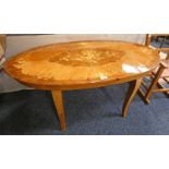 OVAL FLORAL DECORATED TABLE ON 4 SHAPED SUPPORTS,