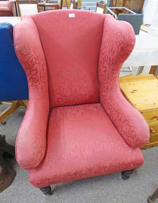 LATE 19TH CENTURY PINK WINGBACK ARMCHAIR ON TURNED SUPPORTS Condition Report: Needs