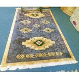 BLUE AND BEIGE RUG 274 X 182CM