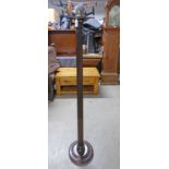 MAHOGANY REEDED STANDARD LAMP ON CIRCULAR BASE