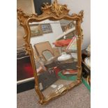 RECTANGULAR GILT FRAMED MIRROR .