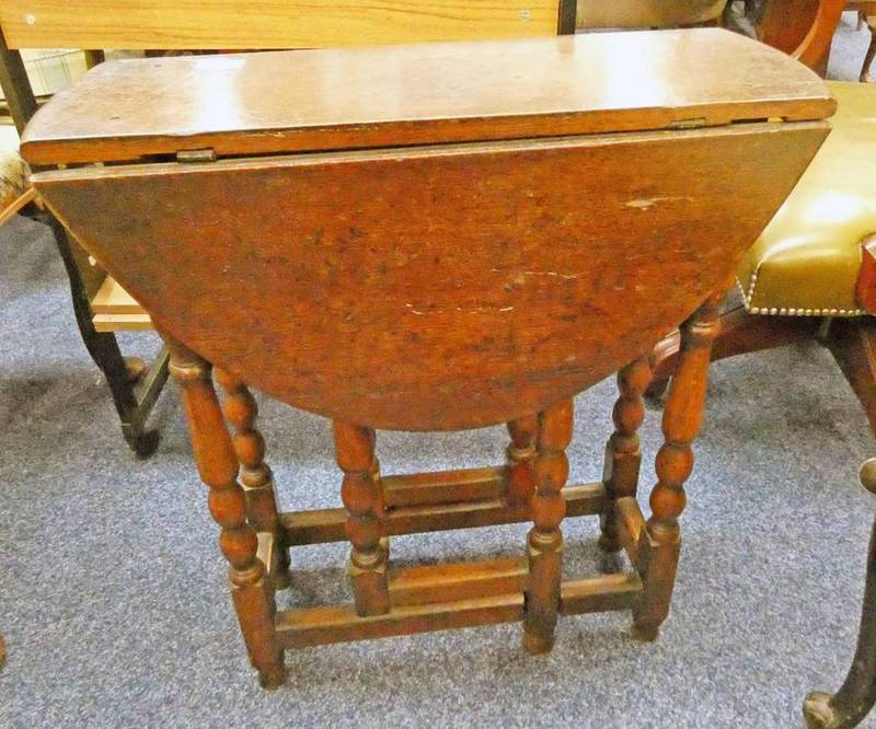 19TH CENTURY OAK SUTHERLAND TABLE ON TURNED SUPPORTS 66CM