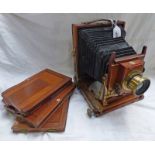 SINGLE PLATE MAHOGANY FOLDING CAMERA BY THORNTON PICKARD, WITH BUSCH'S RAPID SYMMETRICAL F8 LENS,