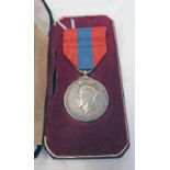A GEORGE V1 IMPERIAL SERVICE MEDAL FOR FAITHFUL SERVICE TO A FREDERICK ERNEST ROACH,
