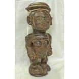 HARDWOOD CONGO STANDING FIGURE WITH INCISED DECORATION,