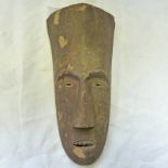 POMU MASK WITH TRACES OF WHITE BAND TO FOREHEAD,