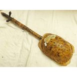 TRIBAL NATIVE 3 STRINGED MUSICAL INSTRUMENT WITH TORTOISESHELL BODY AND CARVED WOODEN SHAFT