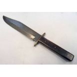 BOWIE KNIFE WITH 25CM LONG CLIP POINT BLADE, REMAINS OF THE MAKERS NAME IS JUST VISIBLE,