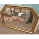 GILT MIRROR WITH SHAPED TOP .