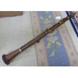 CLARINET BY BESSON & CO LONDON Condition Report: 67.5cm long.