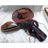 REPLICA WESTERN STYLED GUN BELT AND HOLSTER WITH REPLICA 45 COLT BULLETS ALONG WITH A COW BOY HAT