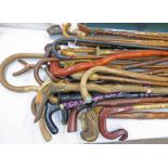 A GOOD AND VAST SELECTION OF VARIOUS WALKING STICKS