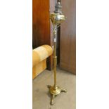 ARTS & CRAFTS STYLE BRASS STANDARD LAMP Condition Report: Has been converted for