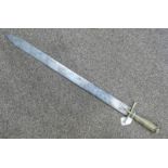 SUDANESE SWORD WITH ETCHED DOUBLE EDGED BLADE, BRASS CROSS PIECE AND HIDE BOUND GRIP,