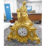 19TH CENTURY GILT MANTLE CLOCK WITH FIGURAL DECORATION - 39CM TALL