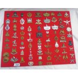 SELECTION OF CAP BADGES TO INCLUDE 6TH AND 10TH GURKAS, MMG, YORKSHIRE, CARIBINIERS,