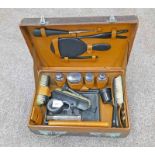 LEATHER CASED DRESSING SET WITH 4 SILVER TOPPED BOTTLES & VARIOUS HARDWOOD FITTINGS