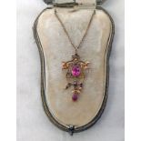 LATE 19TH OR EARLY 20TH CENTURY GEM SET PENDANT MARKED 9CT ON FINE CHAIN IN BOX BY ELKINGTON & CO