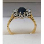 SAPPHIRE & DIAMOND SET 3 STONE RING MARKED 750