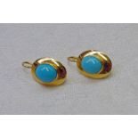 PAIR TURQUOISE SET EARRINGS IN SETTING MARKED 750