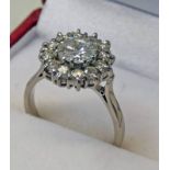 DIAMOND SET CLUSTER RING, THE CENTRE DIAMOND OF APPROX 1.00 CARATS, THE REMAINING DIAMONDS APPROX 0.