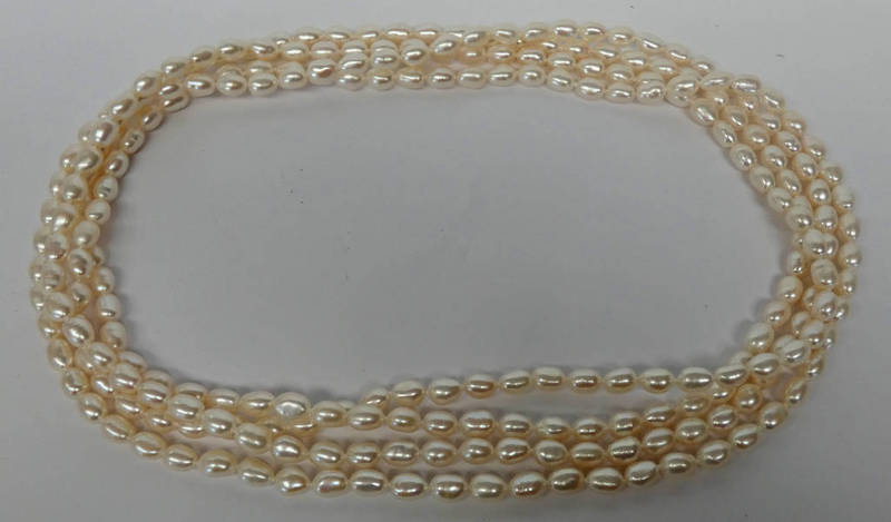 LONG STRAND OF FRESH WATER PEARL BEADS,