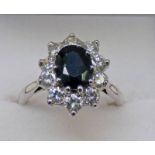 SAPPHIRE & DIAMOND SET CLUSTER RING THE SHANK MARKED 18CT & PLATINUM. THE DIAMONDS APPROX 1.