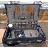 LEATHER CASED SILVER MOUNTED VANITY SET INCLUDING SILVER TOPPED BOTTLES,