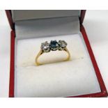 DIAMOND AND SAPPHIRE SET 3 STONE RING MARKED 18CT Condition Report: Ring size M