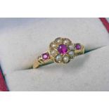 18CT GOLD PEARL & RUBY SET RING Condition Report: Ring size: N. Hallmarks rubbed.