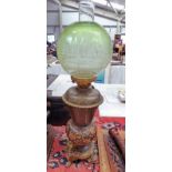 ARTS & CRAFTS STYLE LAMP WITH GREEN GLASS GLOBE AND HEAVY BRASS LIONS PAW BASE