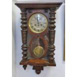 OAK WALL CLOCK WITH GLASS PANELLED DOOR