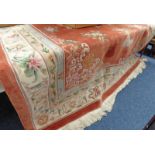 ORANGE GROUND CHINESE FLORAL DECORATED CARPET 276 X 365CM Condition Report: Fading