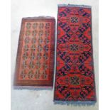 TWO RED AND BLUE EASTERN RUGS - 143 X 55 CMS & 100 X 52 CMS