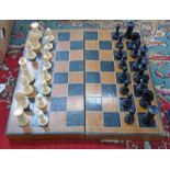 EARLY 20TH CENTURY CHESS SET IN FITTED BOX Condition Report: Kings are 9.4cm tall.