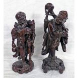 2 X 19TH CENTURY CHINESE CARVED WOODEN FIGURES OF TRAVELLERS - 30 CM TALL