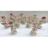 9 19TH CENTURY CONTINENTAL PORCELAIN MUSICAL CHERUB FIGURES, TALLEST 11.