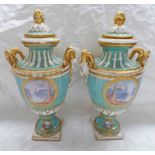 PAIR OF CONTINENTAL PORCELAIN PALE GREEN LIDDED VASES WITH TWIN GOATS MASK HANDLES ON SQUARE BASES