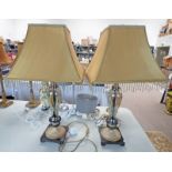 PAIR OF GLASS BODIED TABLE LAMPS ON SQUARE PLINTH BASES,