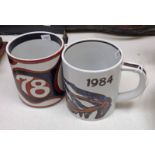 2 ROYAL COPENHAGEN FAJANCE MUGS FOR THE YEARS 1978 AND 1984,