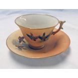 ROYAL WORCESTER CUP AND SAUCER WITH AVIAN DECORATION Condition Report: crack to side