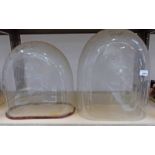 2 LARGE 19TH CENTURY GLASS DOMES Condition Report: Largest has a repaired section