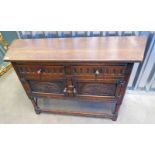 EARLY 20TH CENTURY OAK CABINET WITH 2 DRAWERS OVER 2 PANEL DOORS ON TURNED SUPPORTS, MAX.