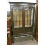 EARLY 20TH CENTURY MAHOGANY CABINET WITH 2 ASTRAGAL GLASS DOORS ON SQUARE SUPPORTS,