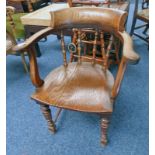 LATE 19TH CENTURY OAK CAPTAINS CHAIR ON TURNED SUPPORTS