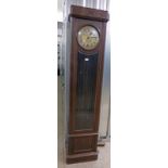 OAK CASED EARLY 20TH CENTURY LONG CASE CLOCK IN THE ARTS & CRAFTS STYLE