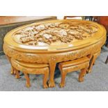 EASTERN CARVED HARDWOOD OVAL NEST OF 7 TABLES ON CLAW FEET