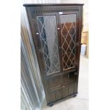 ERCOL OAK CORNER CABINET WITH 2 LEADED GLASS DOORS & 2 PANEL DOORS 168CM TALL X 69CM WIDE