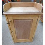 LATE 19TH CENTURY MAHOGANY CABINET WITH GALLERY TOP & SINGLE PANEL DOOR OPENING TO SHELVED INTERIOR